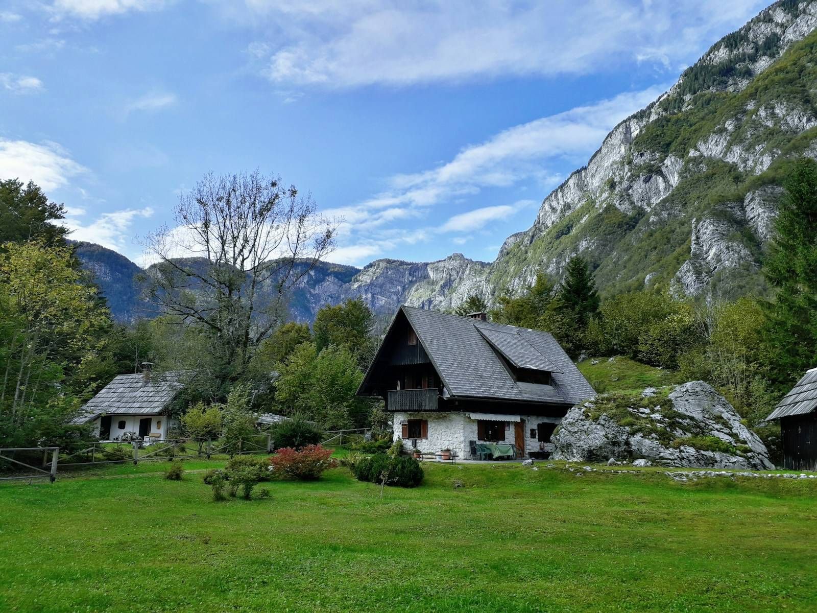 Family house in the countryside with mountains behind